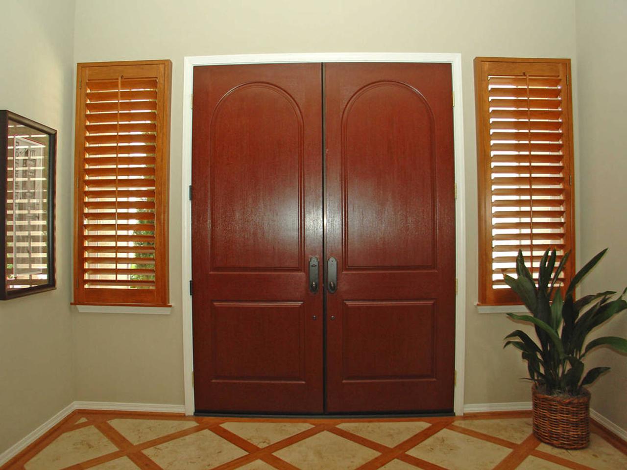 Sidelights with stained wood shutters