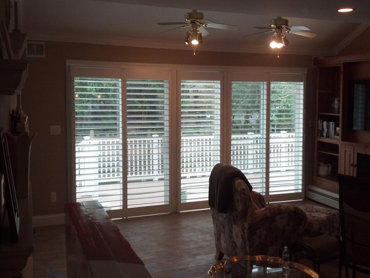 Sliding glass doors with perfect view plantation shutters
