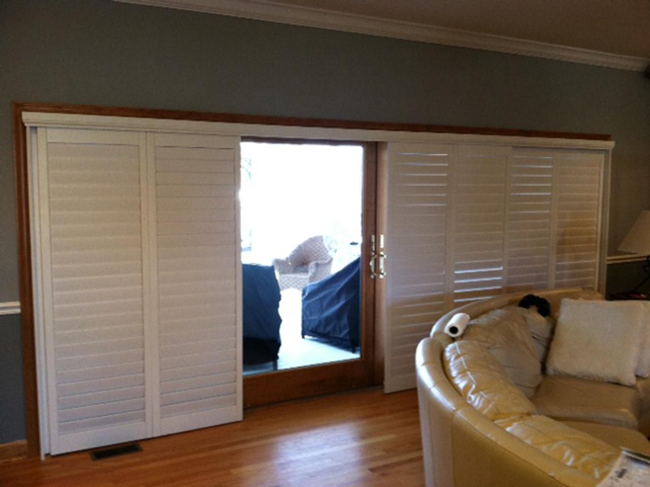 Plantation shutters on French doors bypass open with louvers shut