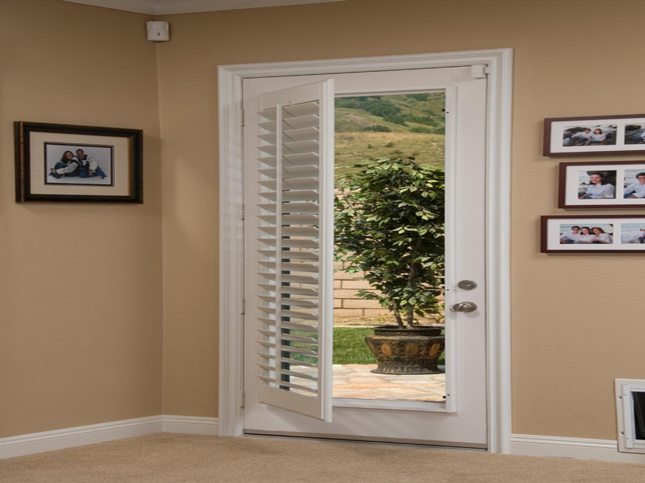 French door with shutters away from the window on the door