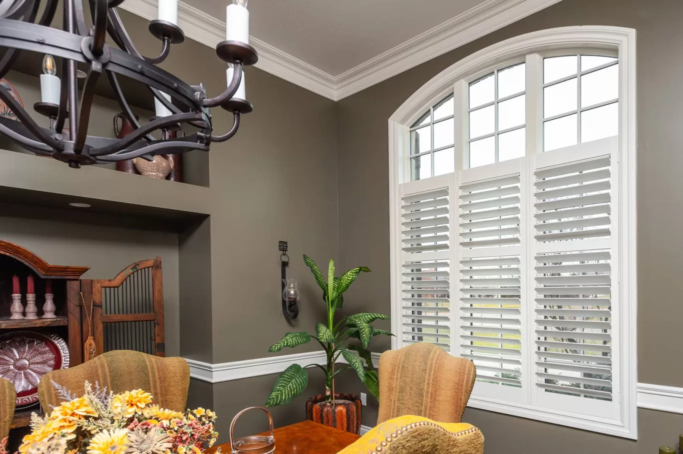 Louver Shop Heritage Wood Shutters on arched dining room window