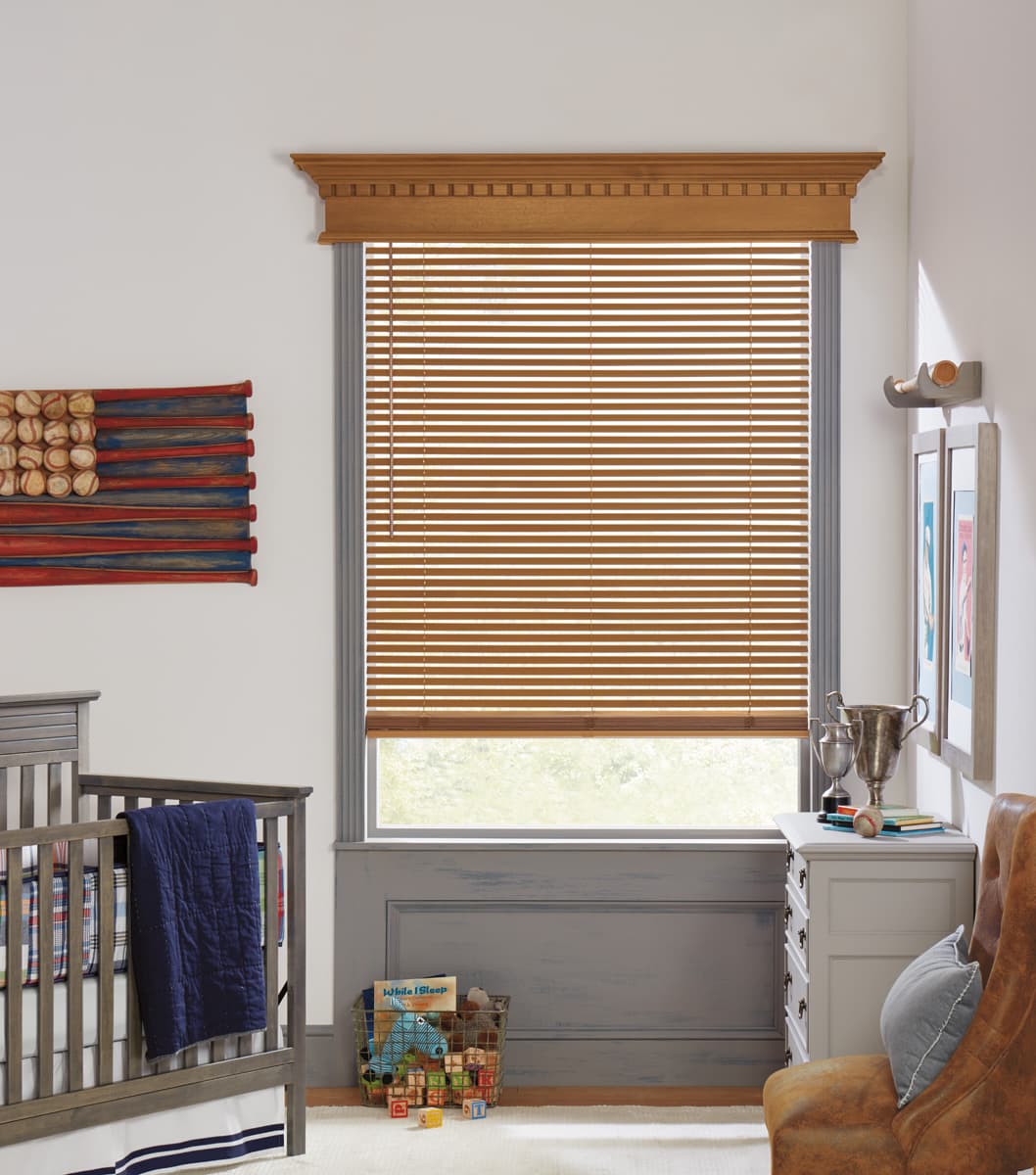 nursery window with wood blinds