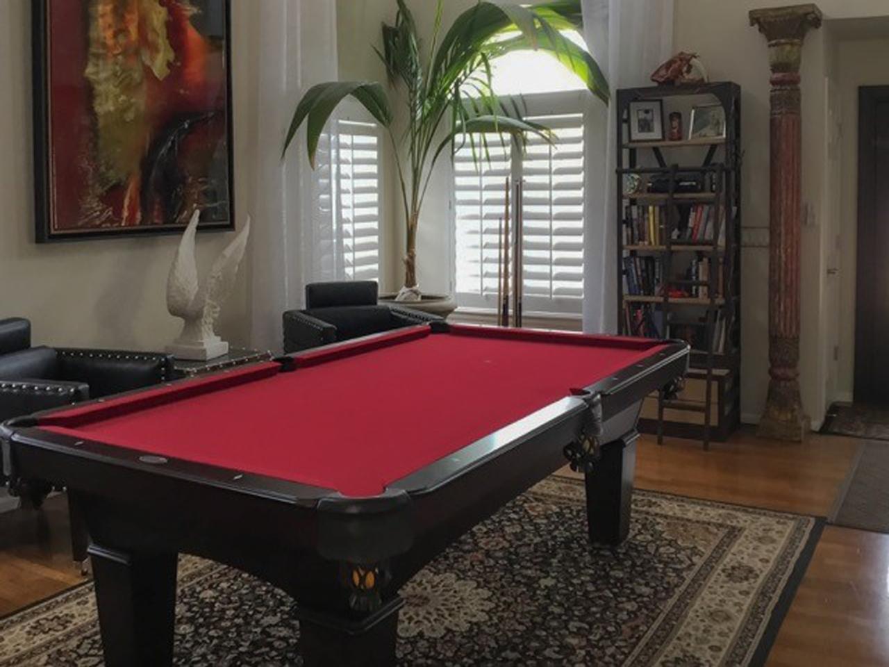Modern rec room with pool table
