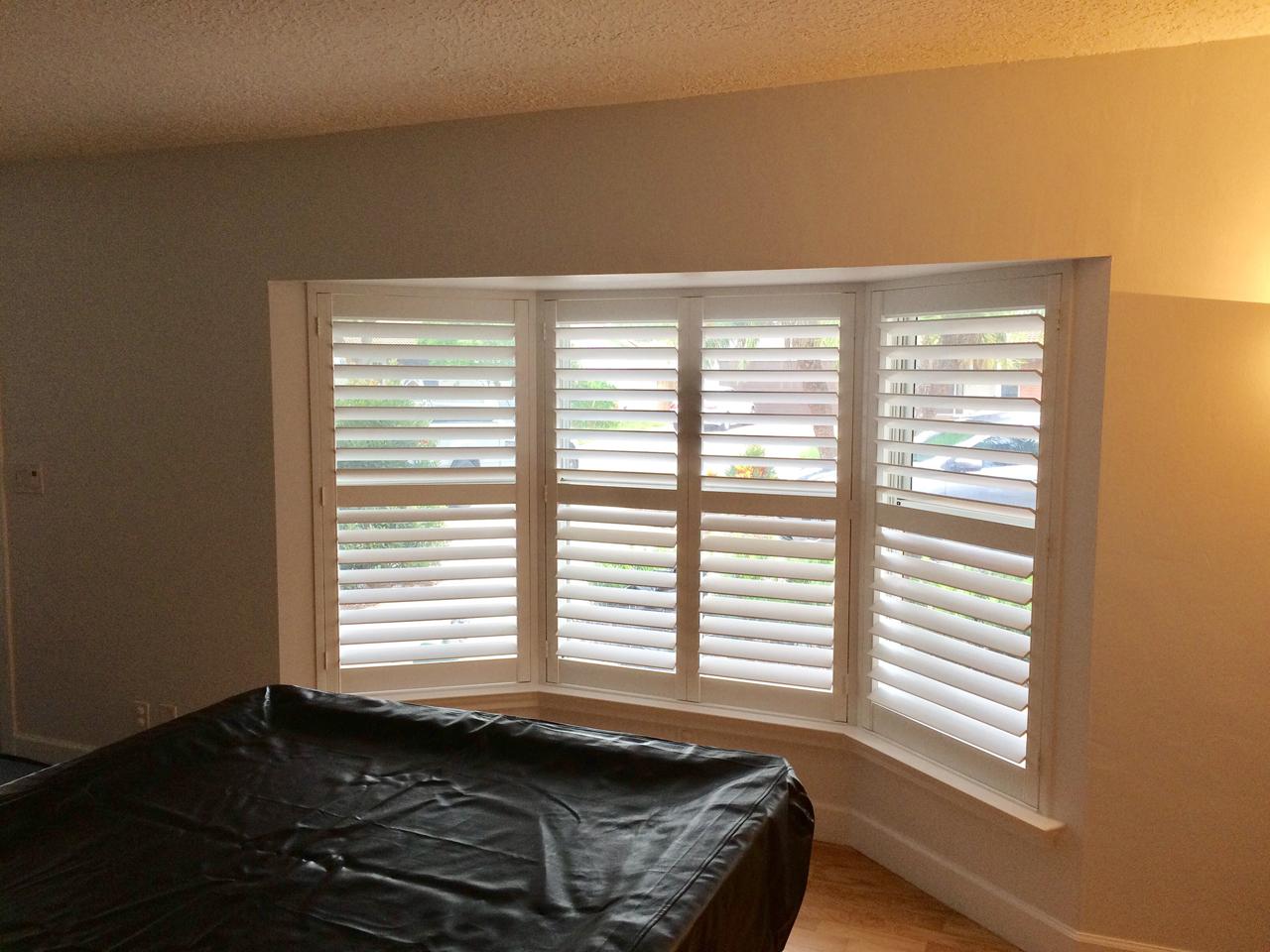 Bay window with perfectview plantation shutters