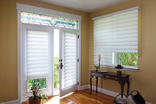 Roman shades on window and French doors