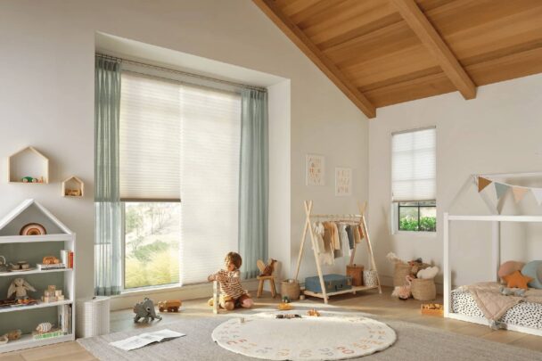 child playing in bedroom with cordless honeycomb shades