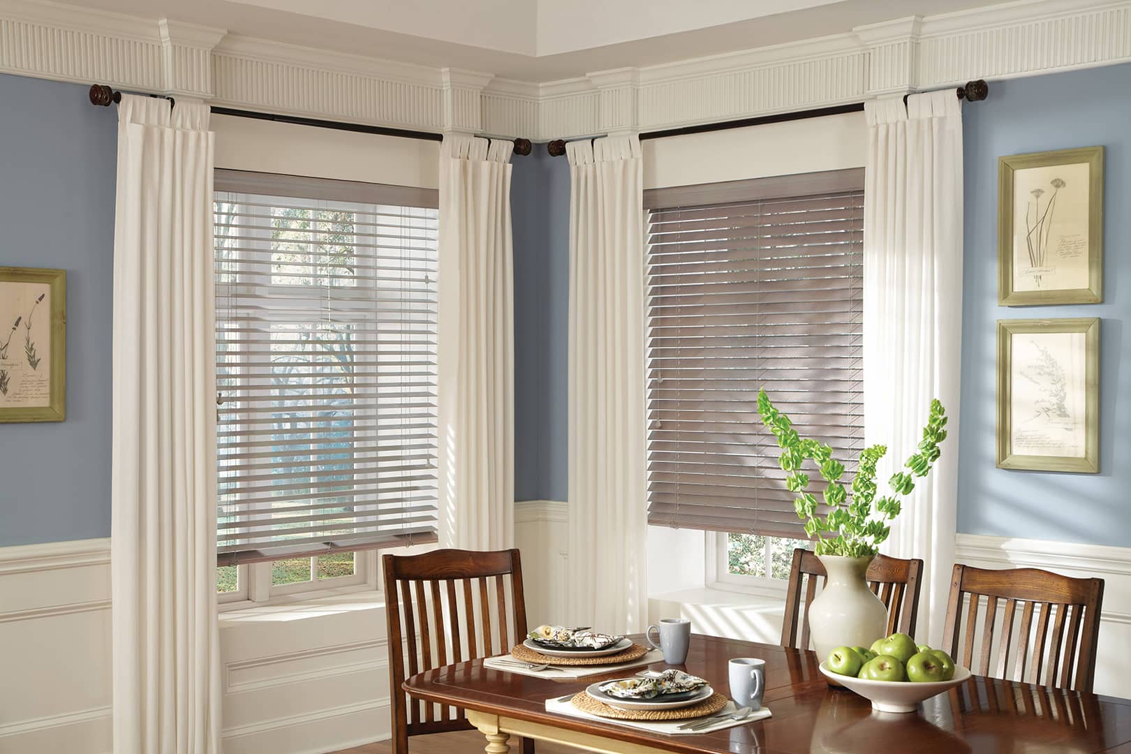 wood blinds and drapes on dining room windows